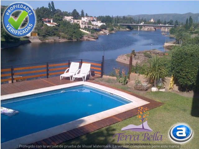 CASA PARA 8/10  SOBRE EL LAGO SAN ROQUE. HERMOSA VISTA. PILETA (COMPARTIDA)