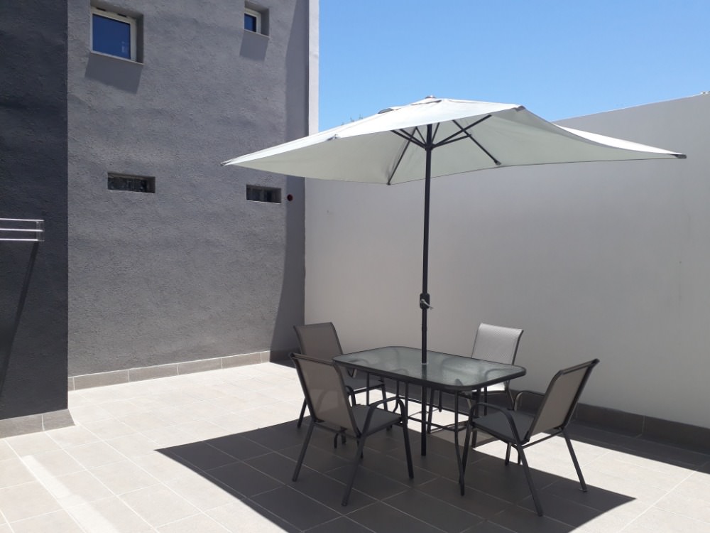 DEPARTAMENTO  CON COCHERA Y PILETA 