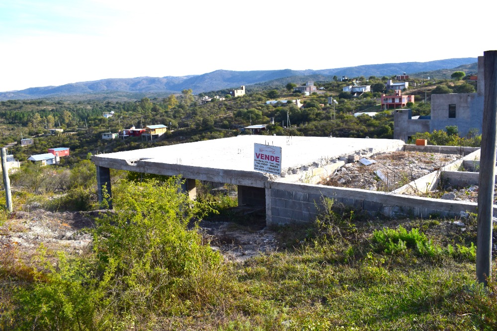 LOTE CON CONSTRUCCIÓN EN FLOR SERRANA
